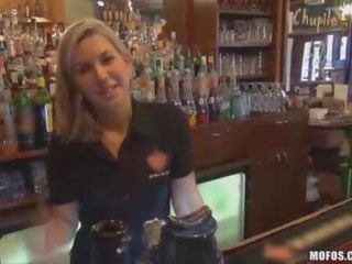 Bartender sucks peter behind counter